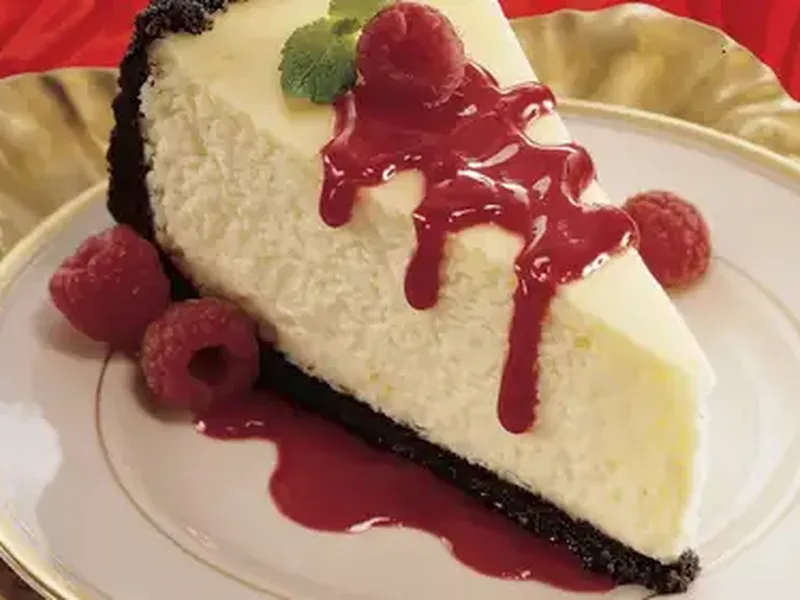Orange Cheesecake with Raspberry Sauce - Rich Citrus Dessert