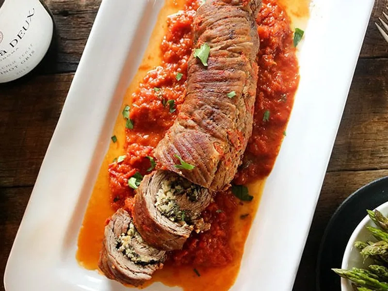Braciole-Inspired Herb-Stuffed Flank Steak Roll