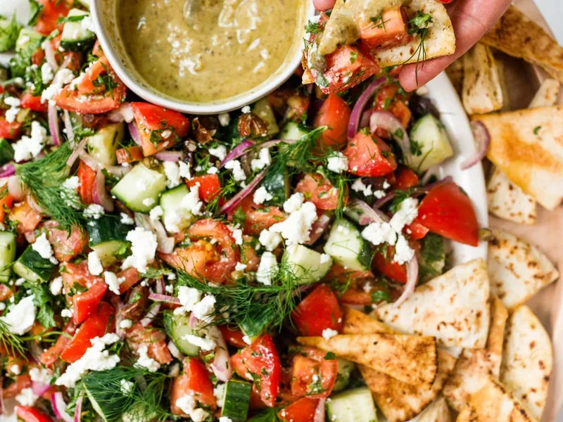 Mediterranean Tomato Cucumber Herb Salad with Pita Chips