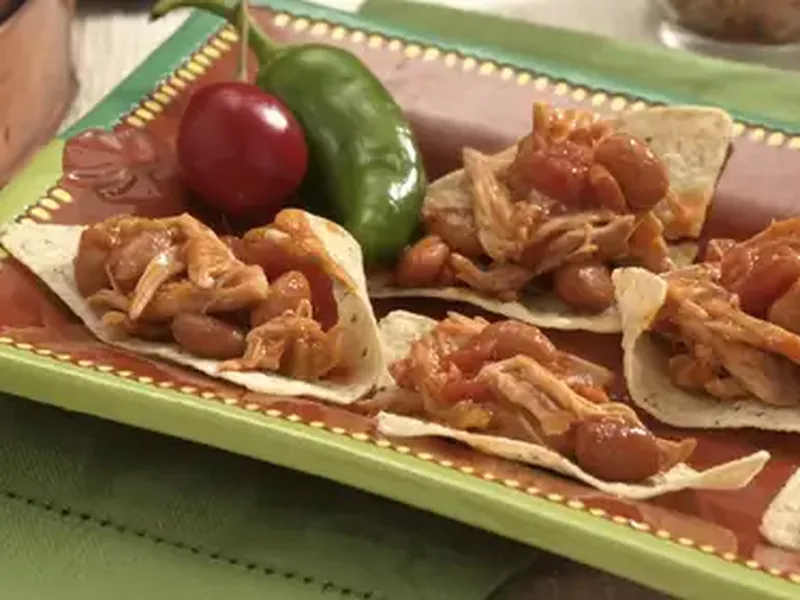 Slow-Cooker Shredded Chicken Nachos with Beans and Chiles