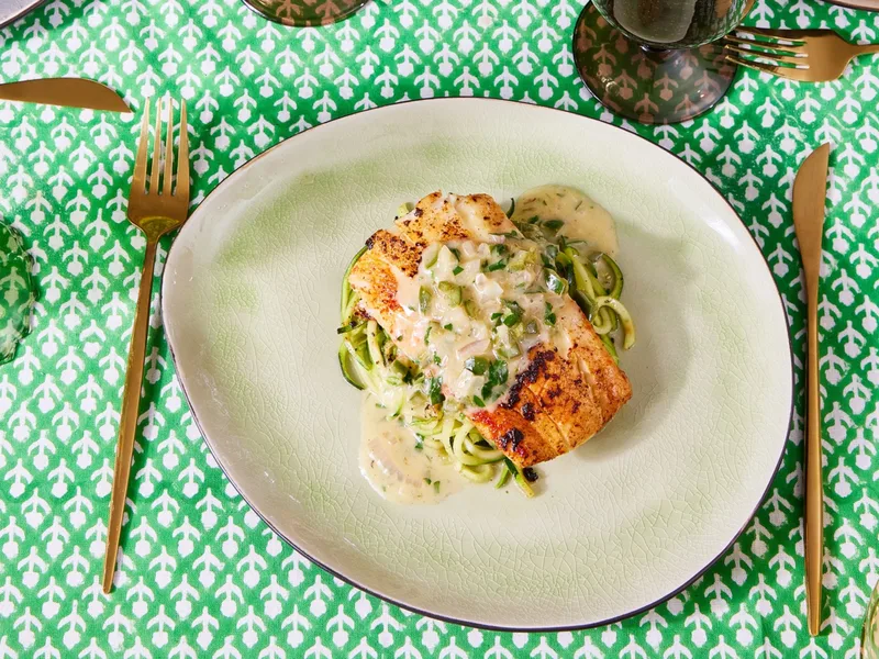 Baked Flounder Fillets with Herb-Lime Butter Sauce and Vegetables