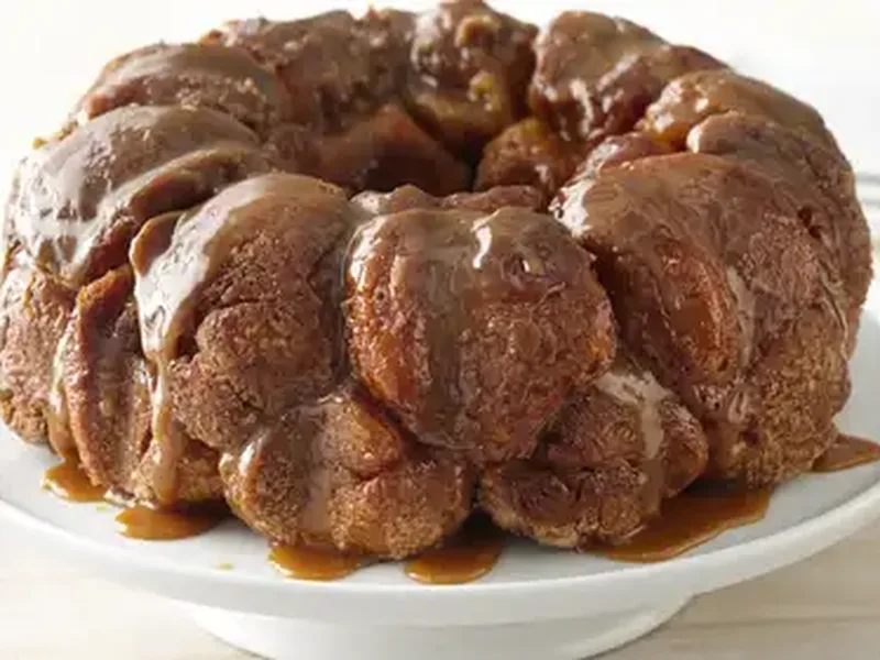 Pumpkin Spice Stuffed Monkey Bread with Caramel Drizzle