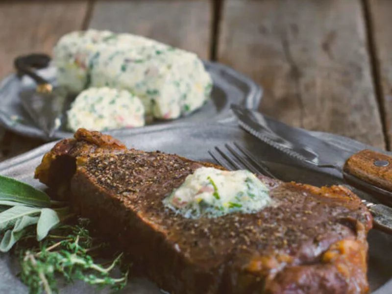 Grilled New York Strip Steak with Chive Worcestershire Butter