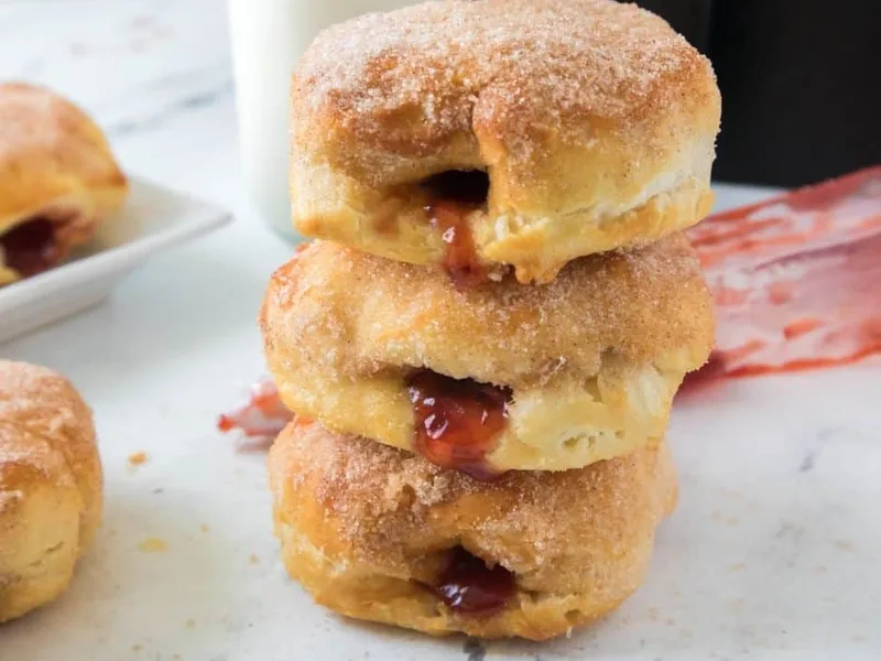 Air Fryer Jelly-Filled Cinnamon Sugar Biscuit Donuts