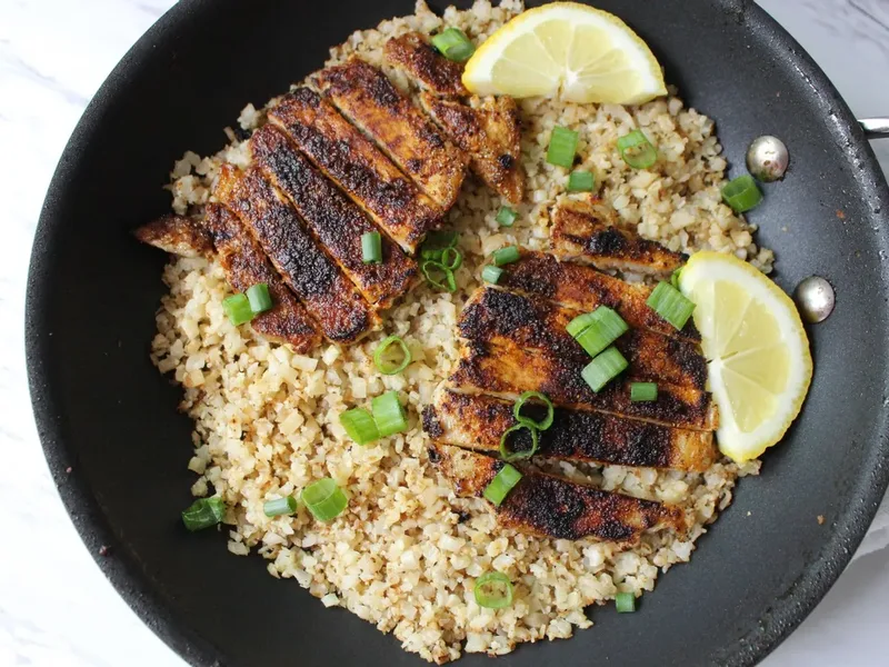 Baked Pork Chops and Cauliflower Rice Skillet with Spices