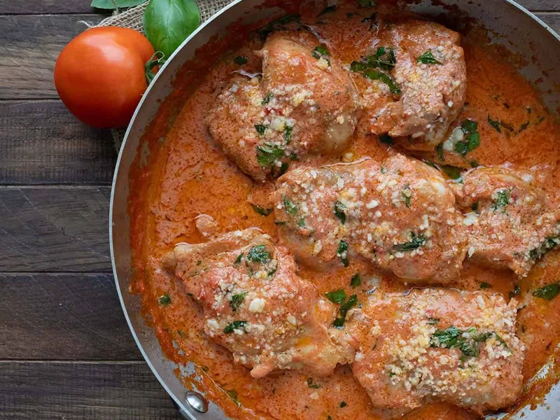 Creamy Tomato Basil Chicken Thighs with Parmesan