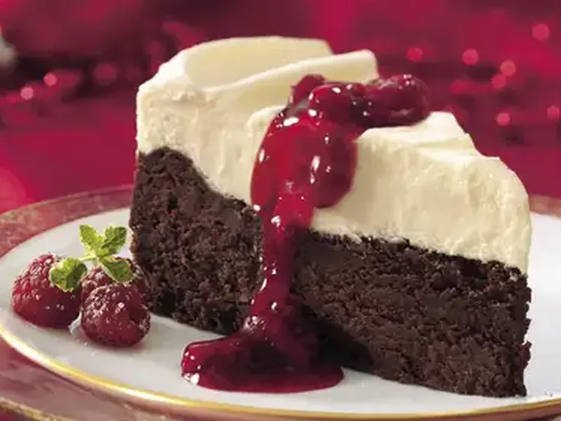 White Chocolate Fudge Torte with Raspberry Sauce
