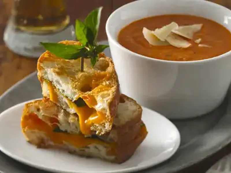Creamy Tomato Soup with Grilled Cheddar-Basil Sandwiches