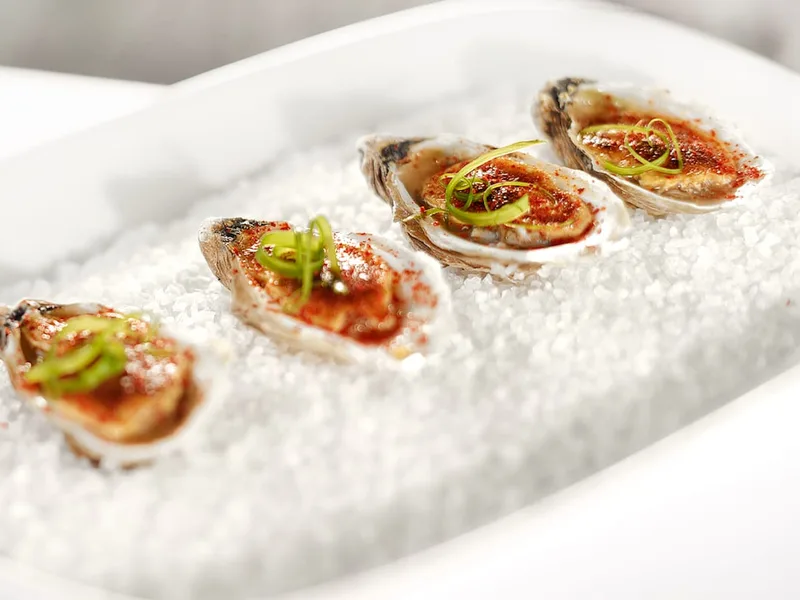 Broiled Oysters with XO-Egg Sauce and Korean Powder