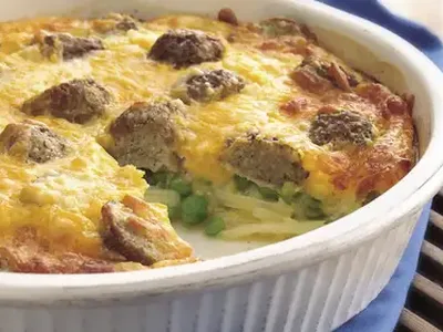 Easy Hash Brown Meatball Pie with Cheddar and Sweet Peas