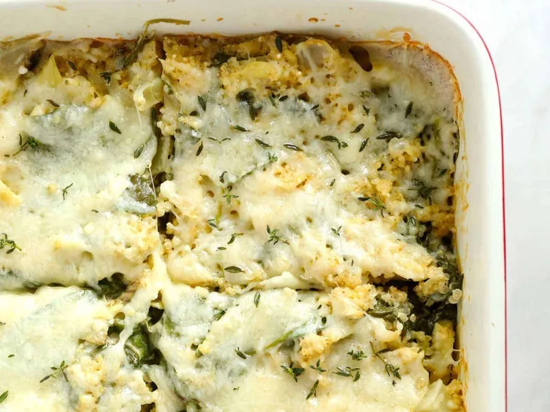 Spinach Artichoke Quinoa Casserole with Creamy Cheese Sauce