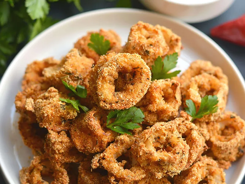 Spicy Sheet Pan Baked Calamari with Almond Flour Coating