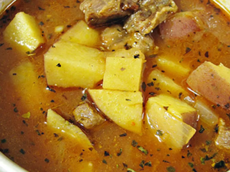 Hearty Red Meat Winter Stew with Root Vegetables and Herbs