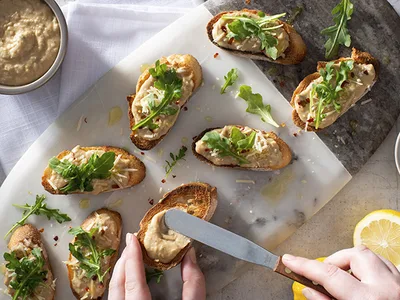 Garlicky White Bean Crostini with Arugula