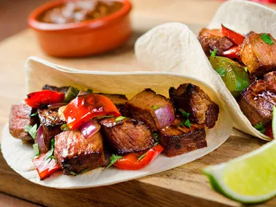 Skillet Steak Tacos with Red Peppers and Onions
