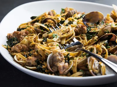 Fresh Whole Wheat Pasta with Saffron, Clams and Italian Sausage