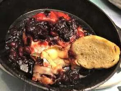 Baked Brie with Cranberry Balsamic Sauce and Crostini