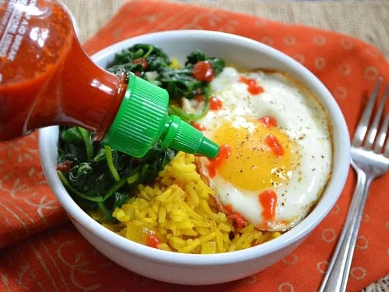 Golden Turmeric Rice Bowls with Sautéed Spinach and Fried Eggs