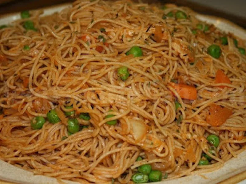 Pasta with Carrots and Peas in Tomato Herb Sauce