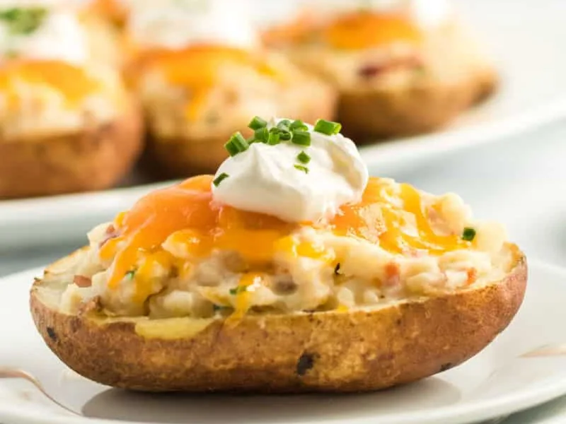 Fully Loaded Twice Baked Potatoes with Bacon and Cheddar