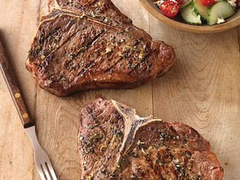Greek-Seasoned T-Bone Steaks with Cucumber Tomato Salad