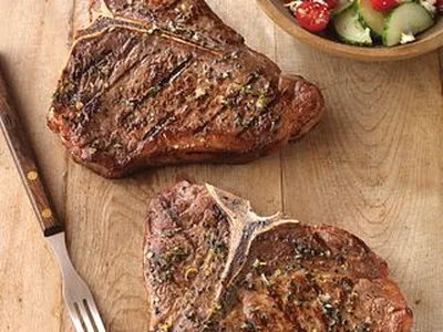 Greek-Seasoned T-Bone Steaks with Cucumber Tomato Salad