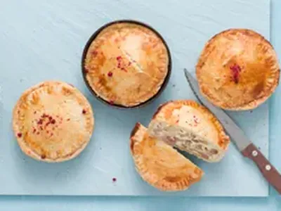 Individual Quiche Lorraine Pies with Bacon and Caramelized Onions