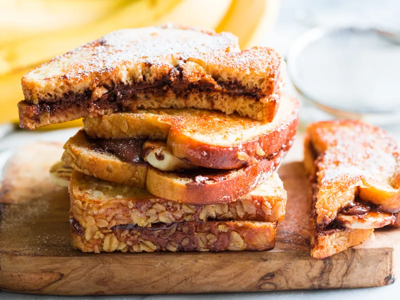 Banana Nutella Stuffed French Toast with Powdered Sugar