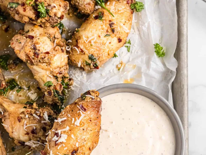 Crispy Baked Garlic-Parmesan Wings with Brown Butter Sauce