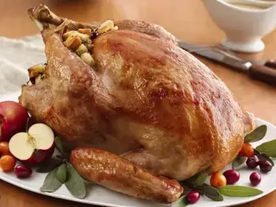 Glazed Roast Turkey with Cranberry Stuffing and Apple Jelly