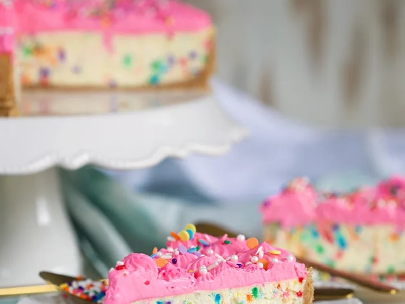 Easy Funfetti Cheesecake with Pink Whipped Cream Topping