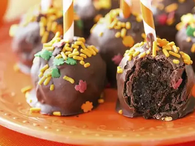 Chocolate Covered Pumpkin Cake Pops with Dark Chocolate Coating