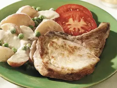Creamy Baked Pork Chops with Potatoes and Peas