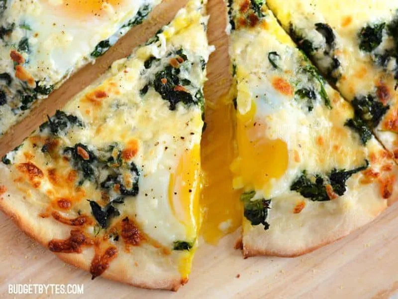 Eggs Florentine Breakfast Pizza with White Sauce and Spinach