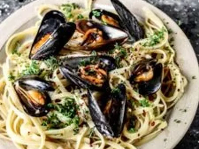 Garlic Herb Mussels in Rosé Wine Broth with Linguine