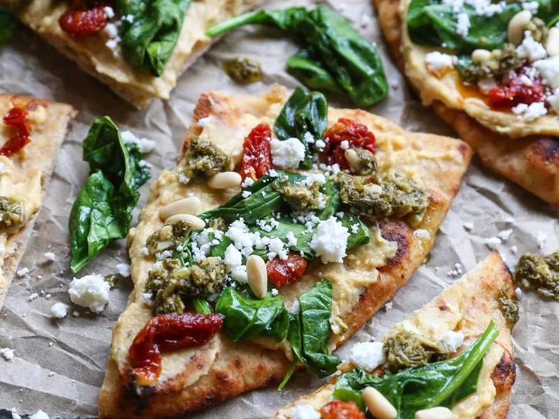 Mediterranean Hummus Flatbread with Spinach and Pesto