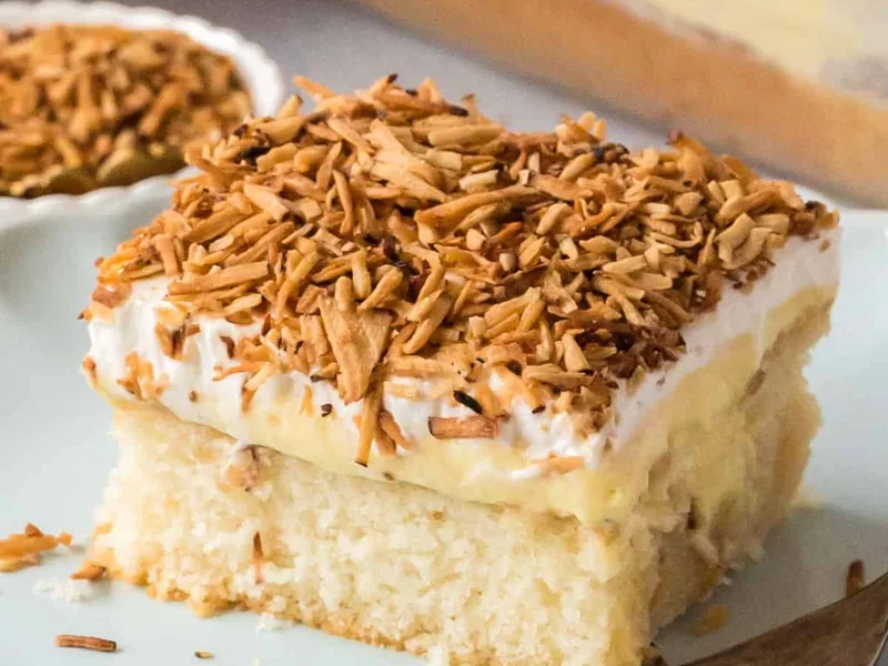 Easy Toasted Coconut Poke Cake with Three Milk Soaking