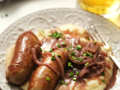 Irish Bangers and Mash with Dubliner Cheese and Rich Onion Gravy