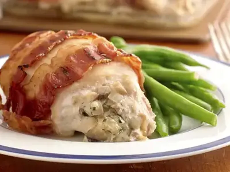 Bacon-Wrapped Gruyère-Stuffed Chicken Breasts with Mushrooms