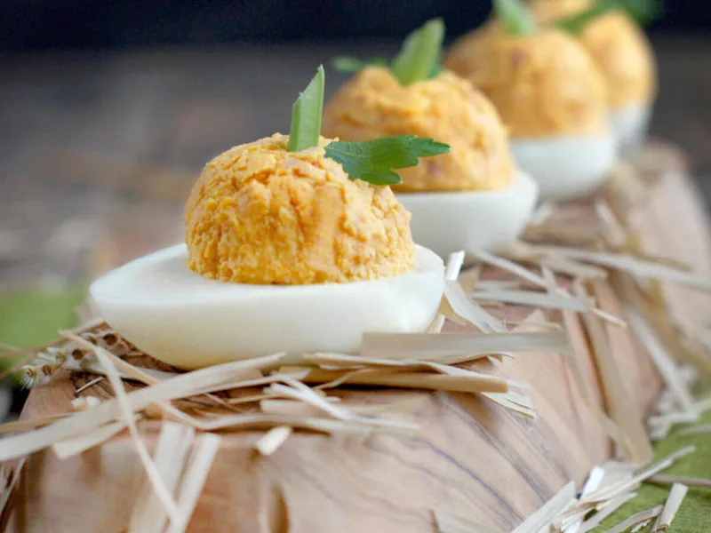 Ham and Pumpkin Deviled Eggs with Shallots and Paprika