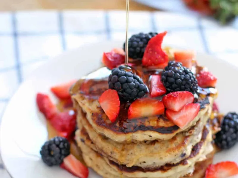 Fluffy Whole Grain Berry Oat Pancakes with Fresh Fruit