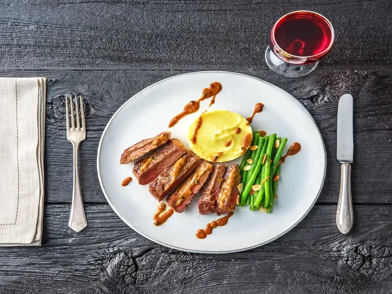 Pan-Seared New York Strip with Truffle Mashed Potatoes