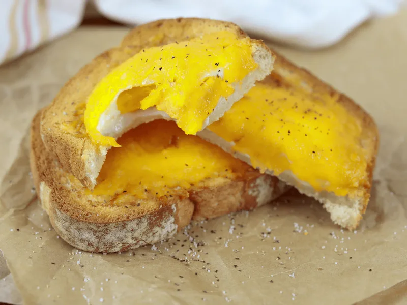 Air Fryer Egg in a Hole Toast with Melted Cheddar