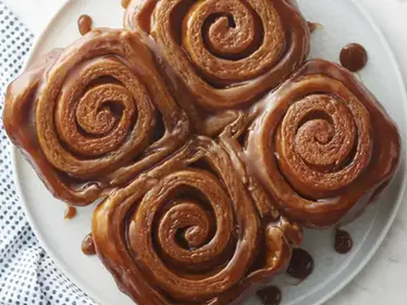 Four Sticky Cinnamon Rolls with Caramel Sauce