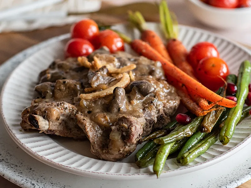 Cajun Smothered Pork Chops with Mushroom Gravy