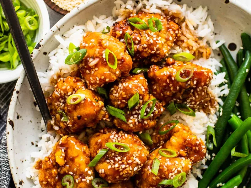 Air Fryer Honey Sesame Chicken with Gochujang Glaze