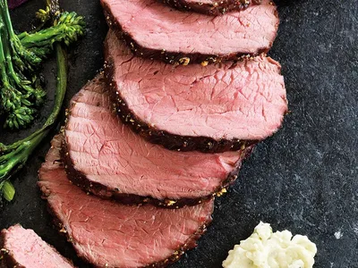 Peppered Top Sirloin Roast with Blue Cheese Broccolini
