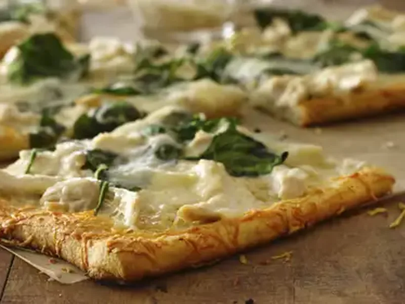 Parmesan Crusted Chicken Alfredo Pizza with Spinach
