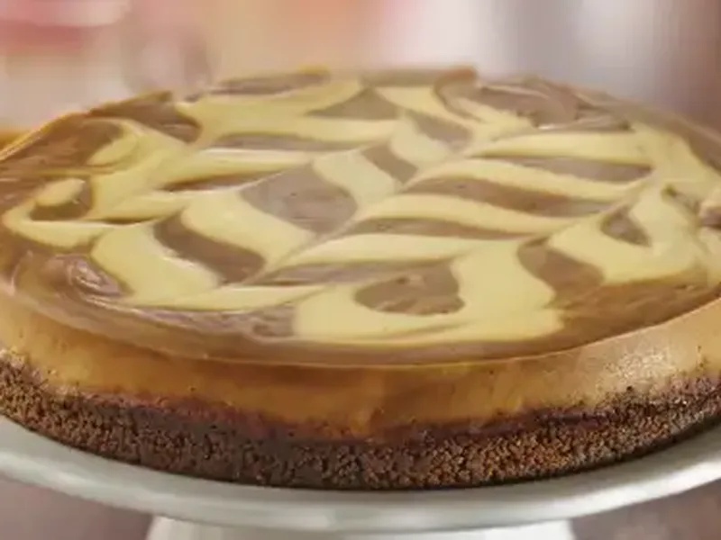 Caramel Apple Butter Marbled Cheesecake with Gingersnap Crust