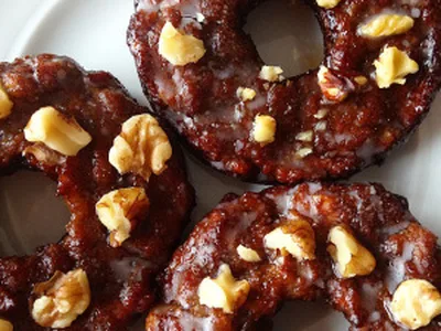 Paleo Maple Glazed Banana Walnut Donuts